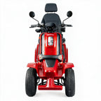 A red and black four-wheel electric lawn mower with a headlight, mirrors, and a backrest seat, shown from a front-facing perspective on a white background.