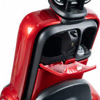 Close-up of a red and black electric scooter showing the open storage compartment and handlebar area against a white background.