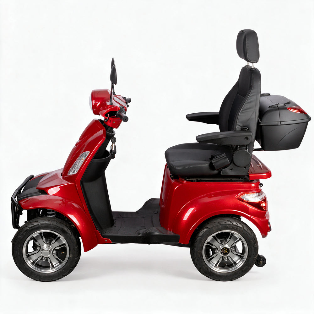 A red and black electric four-wheel scooter with a high-back black seat, headrest, and a black storage trunk, shown from a side profile on a white studio background.