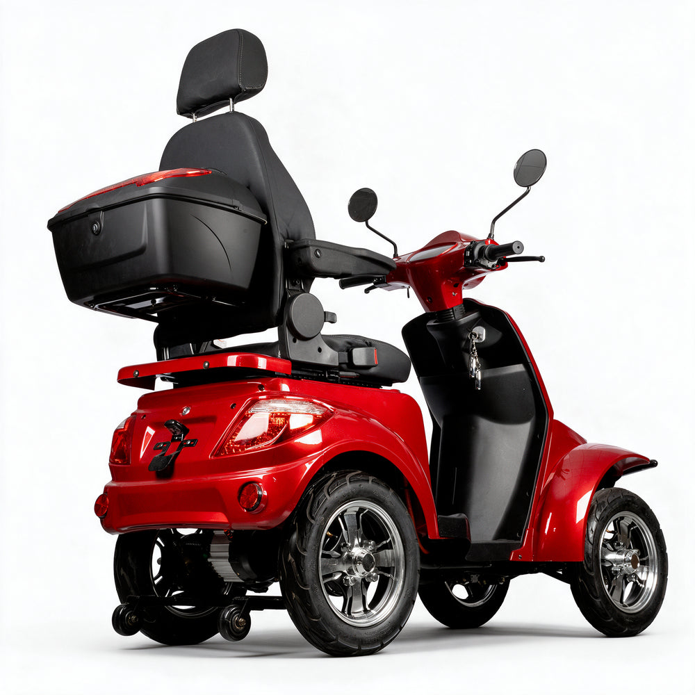 A four-wheeled electric mobility scooter with a rear cargo box and high backrest, shown in red and black on a clean white studio background.